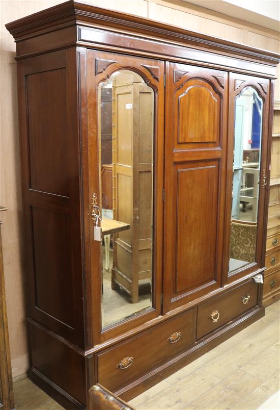 An Edwardian mahogany triple wardrobe W.196cm